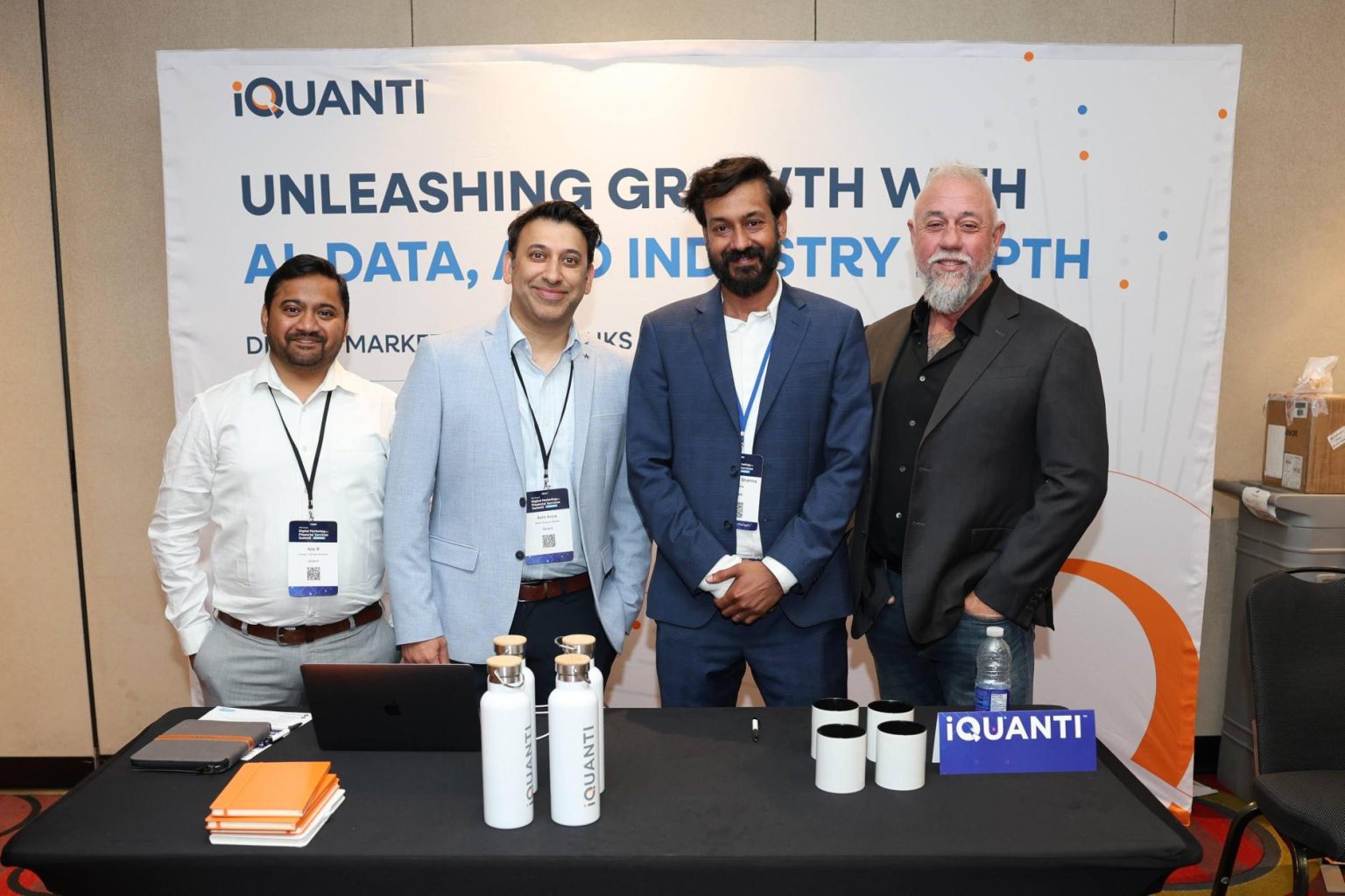 iQuanti team members at the iQuanti booth at DMFS Toronto